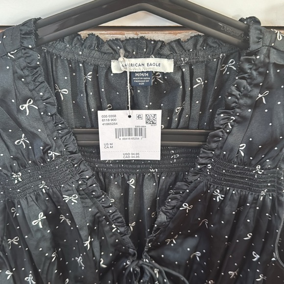 American eagle 🦅 Black Sleeveless Top with Bow Pattern open front - Picture 13 of 13